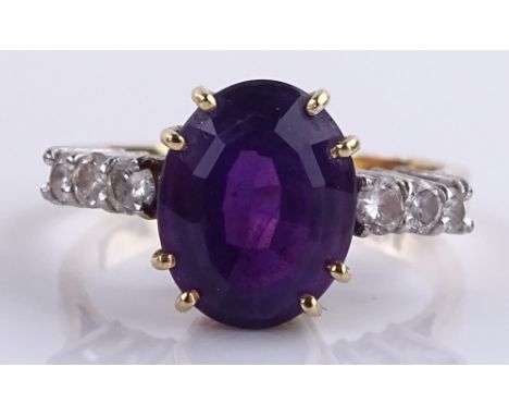 An 18ct gold amethyst and diamond set ring, size K, 3.6g