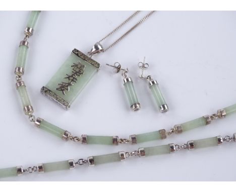 A Chinese jade and silver pendant and chain, and a Chinese suite of jade and silver jewellery