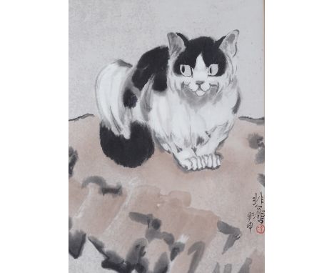 A Chinese School, cat on a rock, almost certainly a print on handmade paper, signed with seal of Xu Beihong, image size 61cm 