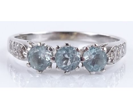 A 9ct white gold blue topaz and diamond ring, size P, 2.7g