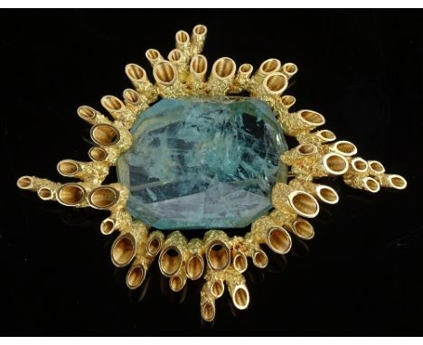From the Collection of HRH The Princess Margaret, Countess of Snowdon: An aquamarine brooch, by John Donald, the central irre