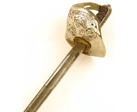 A George V 1897 pattern Infantry Officer's sword, by Wilkinson, pierced and engraved steel bowl hilt with shagreen handle, or