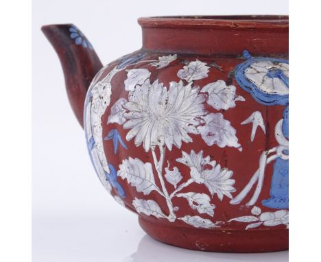 A Chinese redware teapot with blue and white enamel painted decoration, no lid