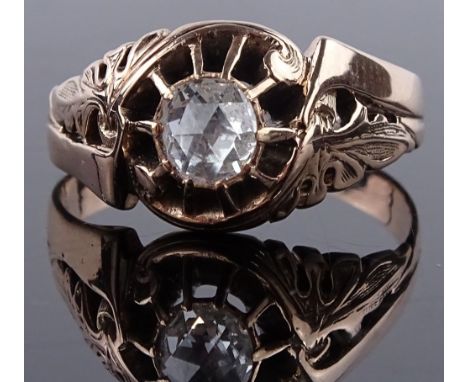 A 19th century unmarked rose gold ring, set with single rose-cut diamond, setting height 10.4mm, size Q, 4.2g