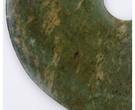 A large Chinese green stone / jade disc, diameter 30cm