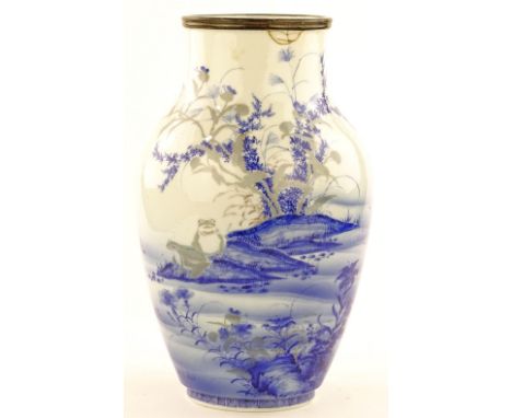 An Oriental blue and white porcelain vase, painted design depicting frogs by a pond, signed under base, height 35cm, repaired