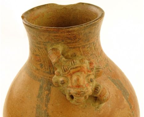 A Chang Kai pre-Columbian terracotta vase, relief moulded jaguar head handle and painted decoration, height 36cm 