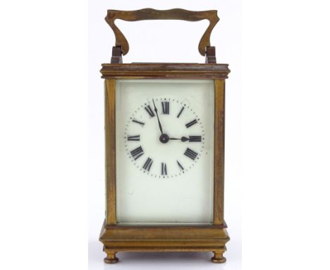 A French brass cased carriage clock, case height 12cm, original leather travelling case