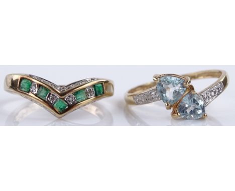 A 9ct gold emerald and diamond wishbone ring, and a 9ct topaz and diamond ring (2)