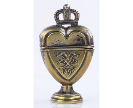 A 19th century brass heart design marriage box with coronet finial dated 1896, height 6cm