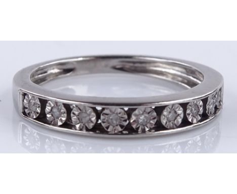 A 9ct white gold diamond set half eternity ring, setting height 3.3mm, size J, 1.9g