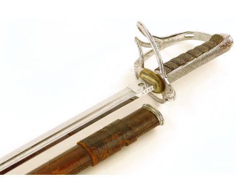 A George V Royal Artillery sword, steel hilt with shagreen grip, leather covered scabbard