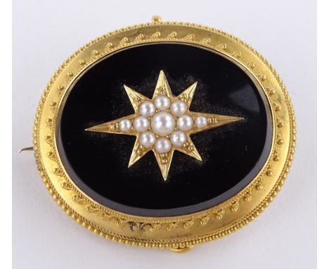 A Victorian unmarked gold seed pearl and onyx memorial brooch / pendant, with hair panel back, length 39.3mm