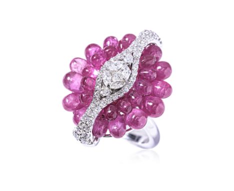 A DIAMOND AND RUBY 'BUBBLE' RING Featuring marquise, princess and round brilliant cut diamonds totalling approximately 1.00 C