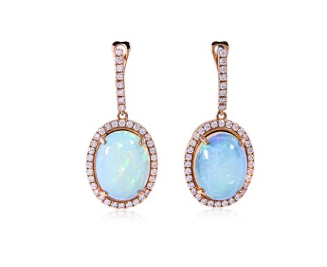 A PAIR OF OPAL AND DIAMOND DROP EARRINGS Featuring a pair of Ethiopian opal cabochons weighing approximately 11.94 Cts (marke