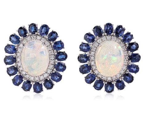 A PAIR OF OPAL, SAPPHIRE AND DIAMOND CLIP EARRINGS Featuring a pair of opal cabochons, likely Ethiopian opals, weighing appro