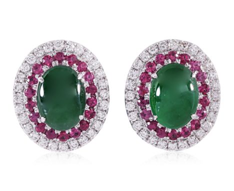 A PAIR OF JADEITE, RUBY AND DIAMOND STUD EARRINGS Featuring two cabochon jadeite pieces totalling approximately 3.09 Cts (mar