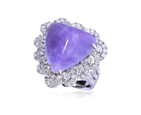 A TYPE A LAVENDER JADEITE AND DIAMOND RING Featuring a triangular carved lavender jadeite measuring approximately 16.99 x 16.