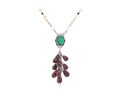 AN EMERALD, TOURMALINE, OPAL, ONYX AND DIAMOND NECKLACE Featuring a cabochon emerald, weighing approximately 14.0 Cts, mounte