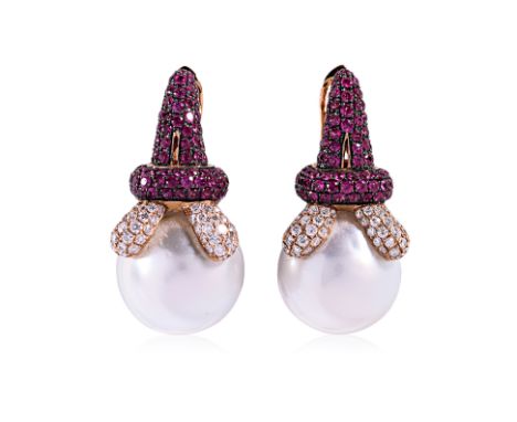 A PAIR OF CULTURED BAROQUE PEARL, RUBY AND DIAMOND EARRINGS Featuring a pair of cultured baroque south sea pearls measuring a