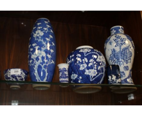 SIX ORIENTAL BLUE AND WHITE CERAMIC ITEMS TO INCLUDE VASES WITH FLORAL DETAIL