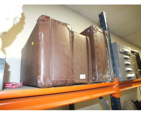 THREE VINTAGE LEATHER SUITCASES TO INC A GLOBE TROTTER EXAMPLE