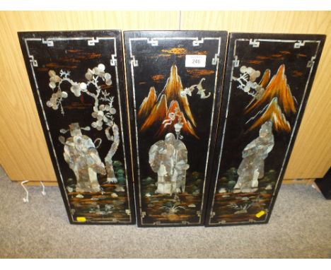 THREE ORIENTAL WOODEN PLAQUES WITH INLAID  MOTHER OF PEARL SHOWING MOUNTAINOUS SCENES  