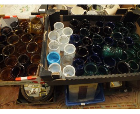 A LARGE QUANTITY OF VINTAGE COLOURED GLASS TEA LIGHT HOLDERS 