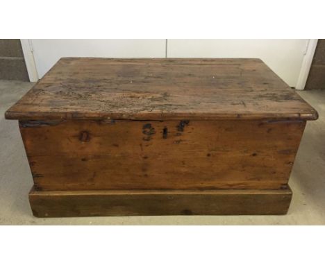 Antique pine trunk with metal handles. 78 x 51cm.