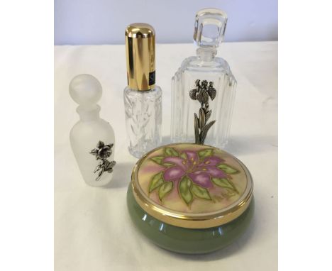 A Stuart Crystal honeysuckle pattern perfume spray, 2 glass perfume bottles with pewter flower decoration and a painted silk 