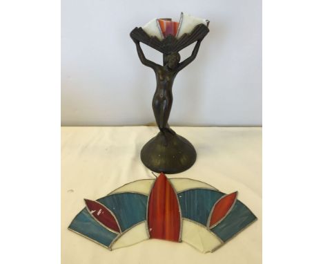 An Art Deco winged lady table lamp, glass shade broken.