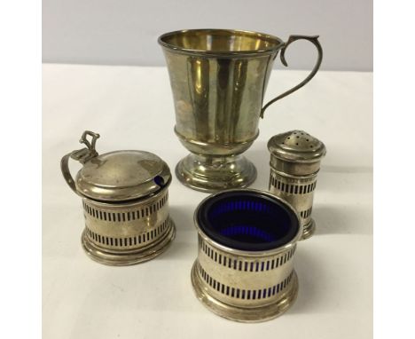 A HM Silver christening mug. Birmingham 1931 (approx 50.5g) together with HM silver salt, mustard pot & pepperette, Birmingha