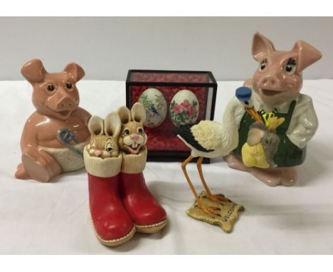 A small quantity of collectible ceramics & items comprising 2 Wade Nat West pigs, a Tuskers Henry 'Bundle of Joy', a Moorcraf