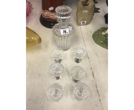 A cut glass liqueur set, six glasses and a decanter