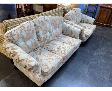 A three seater settee and a matching two seater