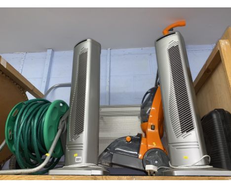 Shelf of assorted including hose reel, heater and fans