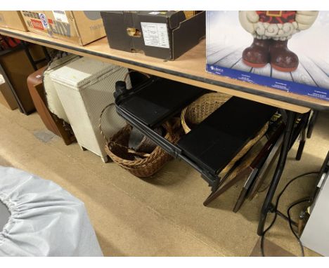 A Loom style linen basket, a bevelled frameless mirror, baskets, advertising mirror and other items