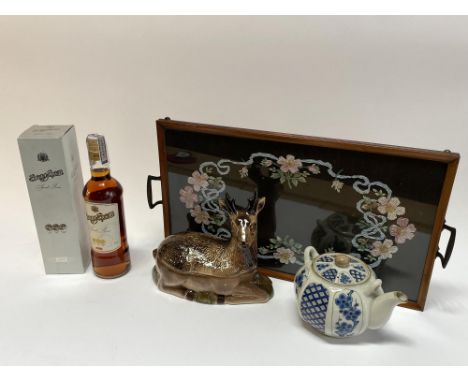 A Continental deer terrine dish, 23cm L, a blue and white teapot, a bottle of Sangsom rum and an embroidered tray