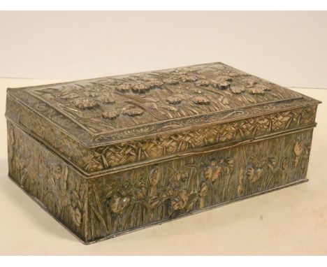 A Japanese silver plated lidded box with all over iris decoration in relief fitted with cedar wood interior. H.9 W.23 D.13cm 
