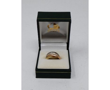 A yellow, red and white metal Russian wedding band. Faint engraving. Ring size K. Weight 5.9g. 