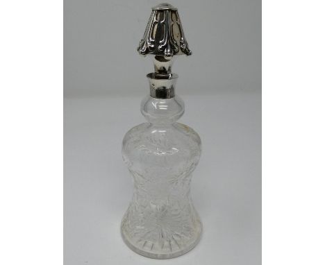 An Edwardian engraved crystal decanter with silver collar and stopper, marked Tiffany &amp; Co, makers, Sterling, C. The bott