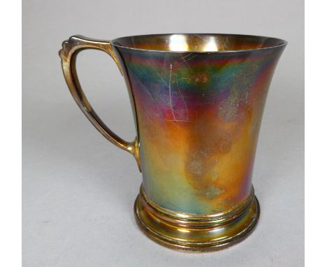 A silver mug - London 1963, William Comyns &amp; Sons Ltd, of flared form, 192g