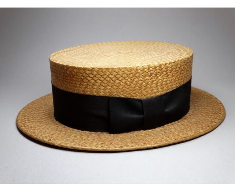 An early 20th century straw boater - with a black silk band, by Dunn &amp; Co, size 7 1/4.