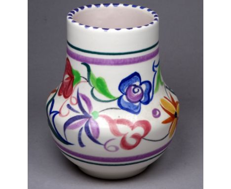 A Poole Pottery vase - of baluster form and with typical floral decoration, height 13cm. 