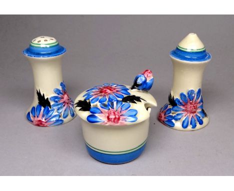 Clarice Cliff - 'Marguerite' pattern cruet set, circa 1933, relief moulded with flowers and foliage, picked out in pink, blue