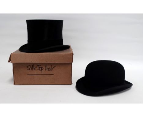 A silk top hat - with cardboard box, together with a bowler by Dunn &amp; Co.