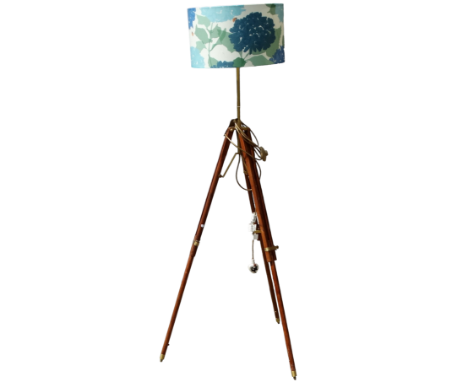 A contemporary standard lamp - with a beech and brass adjustable tripod base, height 164cm.