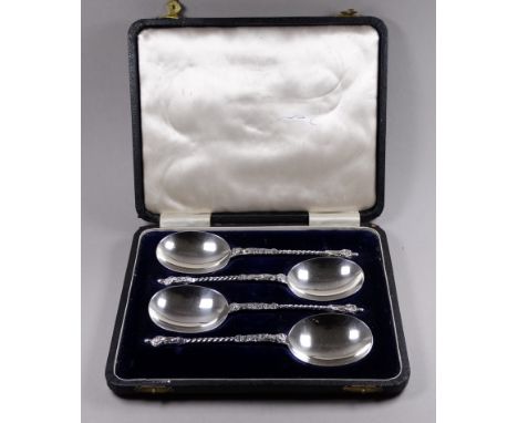 A boxed set of four silver apostle spoons - London 1904, William Hutton &amp; Sons Ltd, weight 198g.