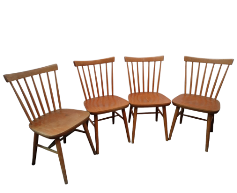 A set of four Ercol style beech dining chairs - with stickbacks and plywood contoured seats.