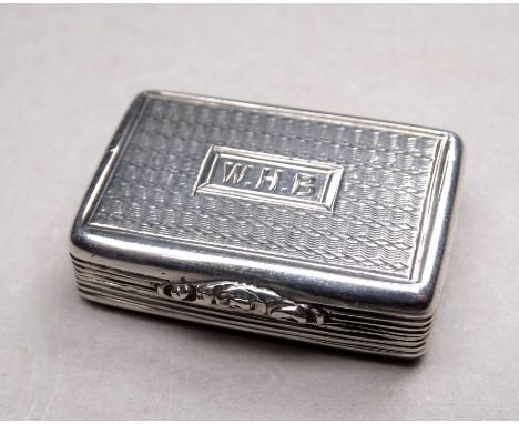 A silver vinaigrette - Birmingham 1831, Taylor &amp; Perry, rectangular with engine turning and ownership initials, the gilt 